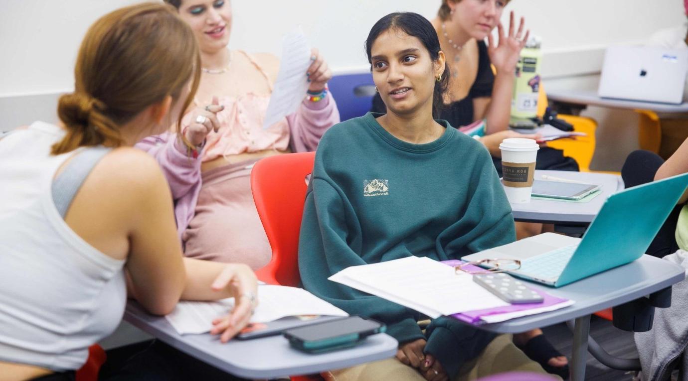 Pitzer students engage in a discussion during class